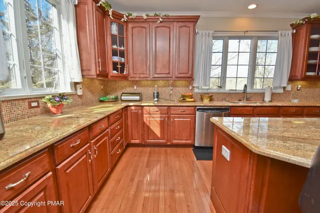 a view of a room with furniture window and wooden floor