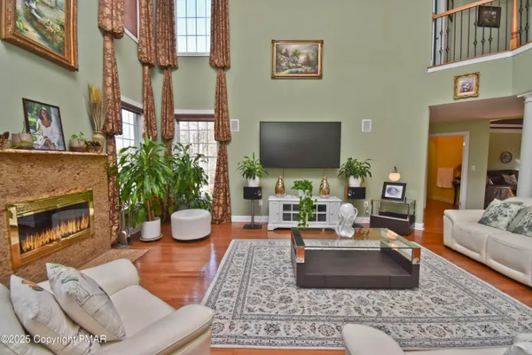 a bedroom with a bed window and dresser