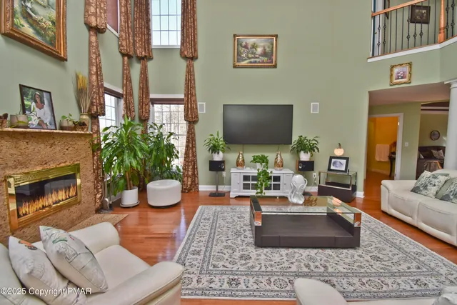 a bedroom with a bed window and dresser