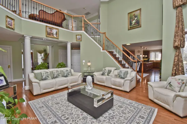 a bed sitting in a bedroom next to a lamp