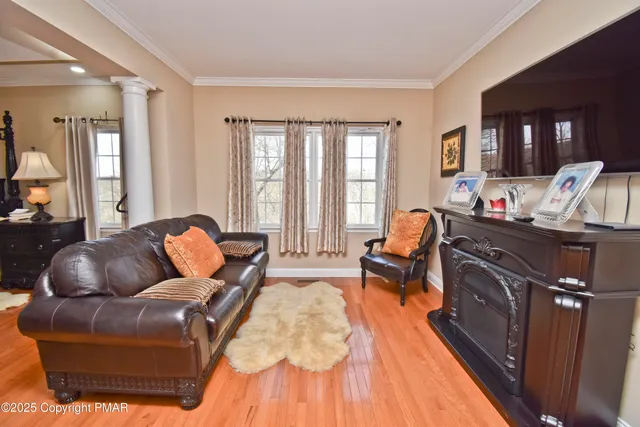 a kitchen with white cabinets and appliances