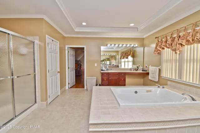 a bathroom with a toilet a sink and a mirror