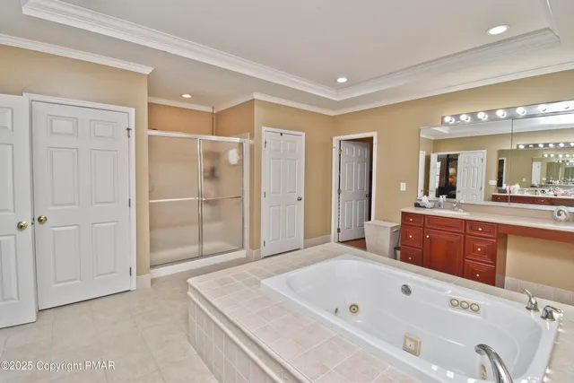 an aerial view of a house with yard porch and furniture