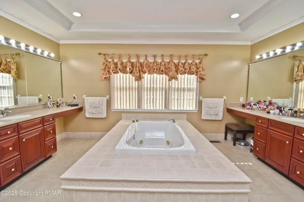 an aerial view of a house with a garden