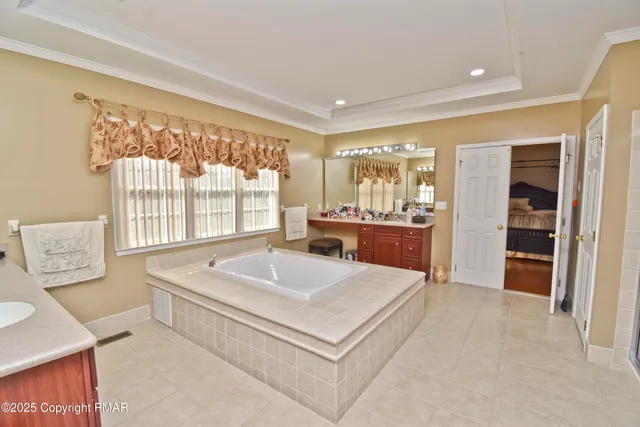 a view of a field with an ocean