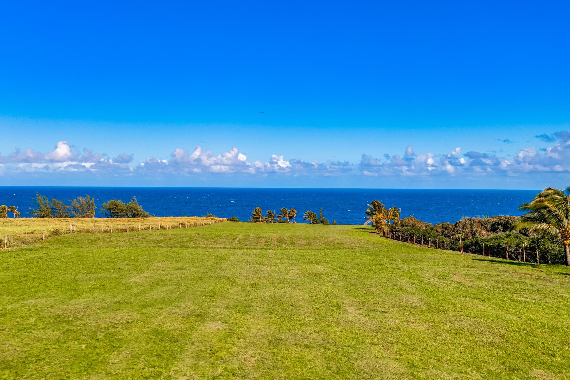 0 Kai Poi Place, Unit A Haiku, HI 96708 - Photo 3 of 21 a view of an ocean from a building