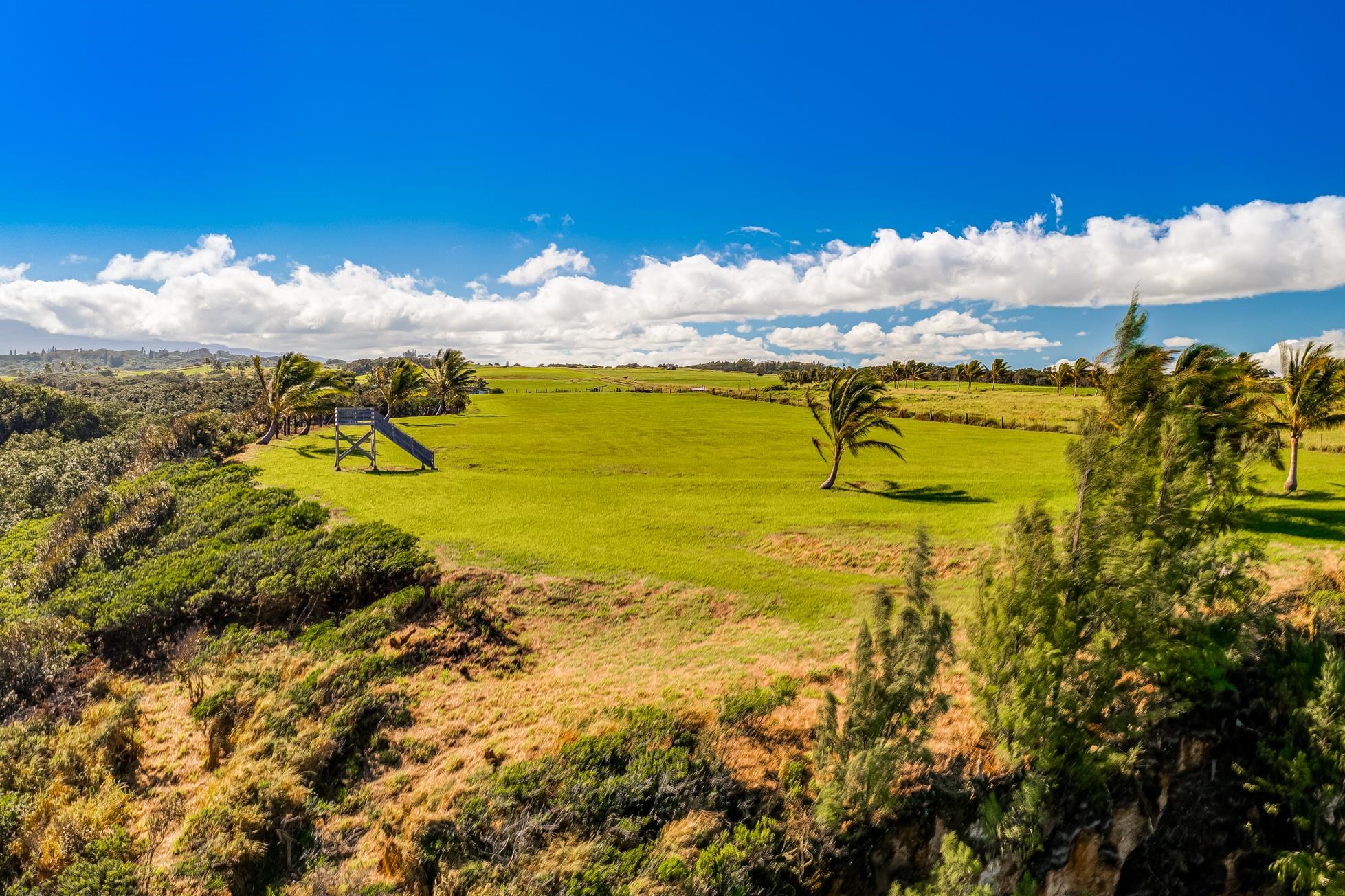 0 Kai Poi Place, Unit A Haiku, HI 96708 - Photo 9 of 21 a view of an ocean and beach