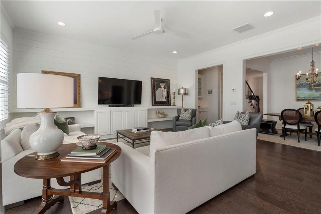 1076 Heyward Way Alpharetta, GA 30009 - Photo 13 of 57 a living room with furniture and a flat screen tv