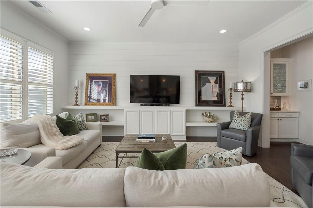 1076 Heyward Way Alpharetta, GA 30009 - Photo 14 of 57 a living room with furniture and a flat screen tv