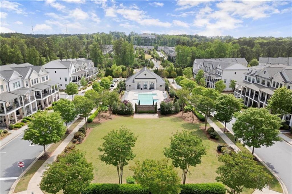 1076 Heyward Way Alpharetta, GA 30009 - Photo 29 of 57 an aerial view of a house with a garden and large trees