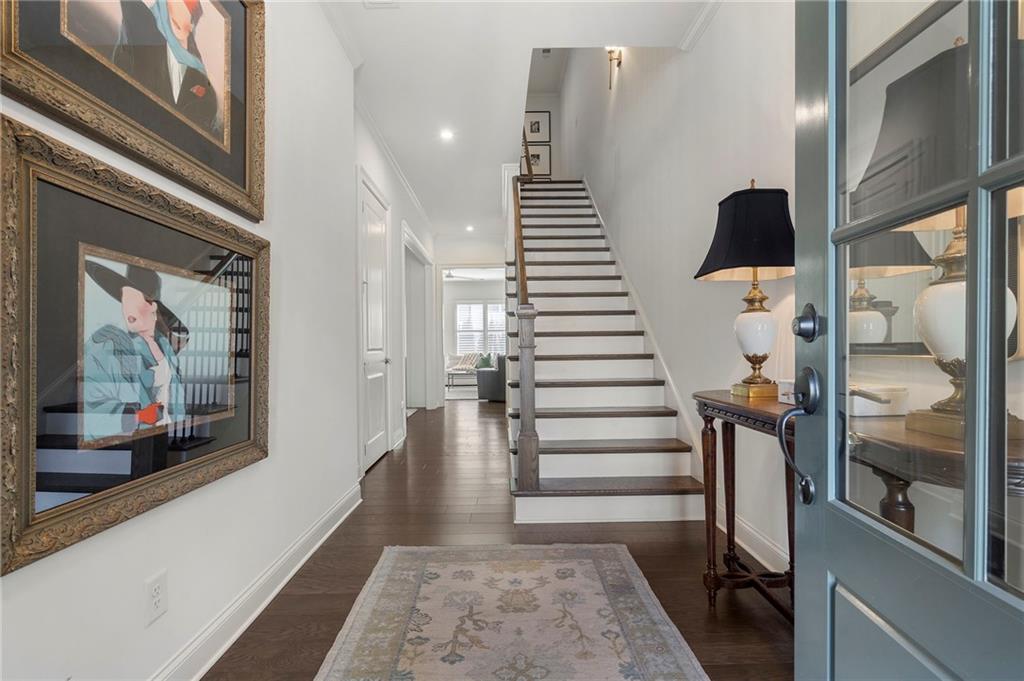 1076 Heyward Way Alpharetta, GA 30009 - Photo 3 of 57 a view of entryway and hall with wooden floor