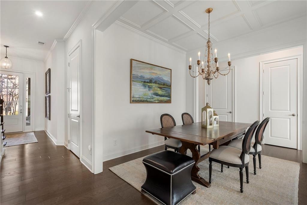 1076 Heyward Way Alpharetta, GA 30009 - Photo 5 of 57 a dining room with furniture and chandelier
