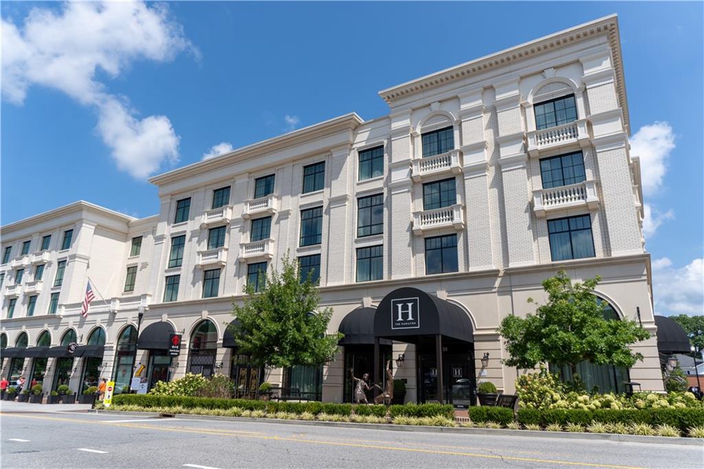 1076 Heyward Way Alpharetta, GA 30009 - Photo 56 of 57 a front view of a building with street view