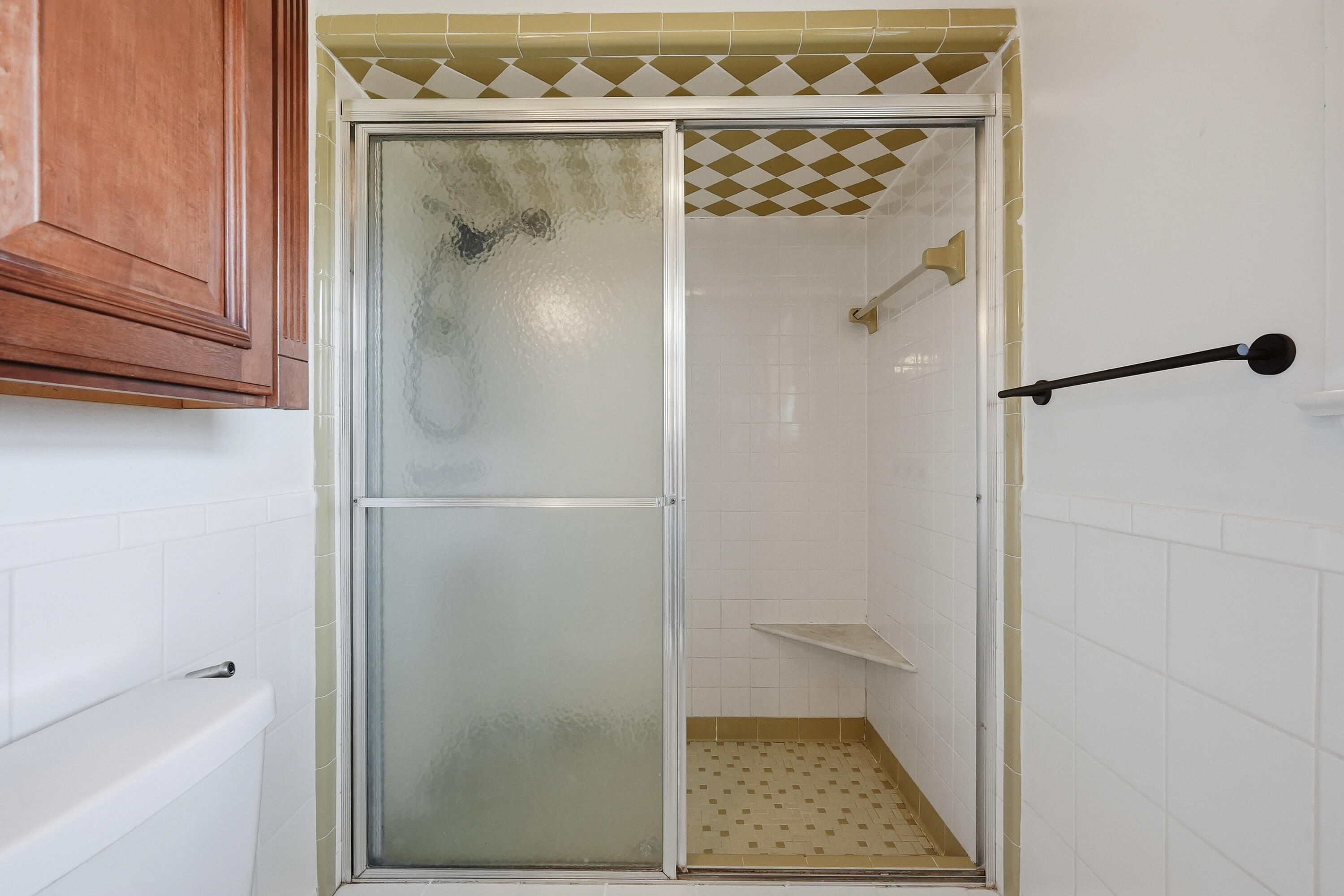 15 Maple Avenue Shalimar, FL 32579 - Photo 23 of 45 a bathroom with a glass shower door