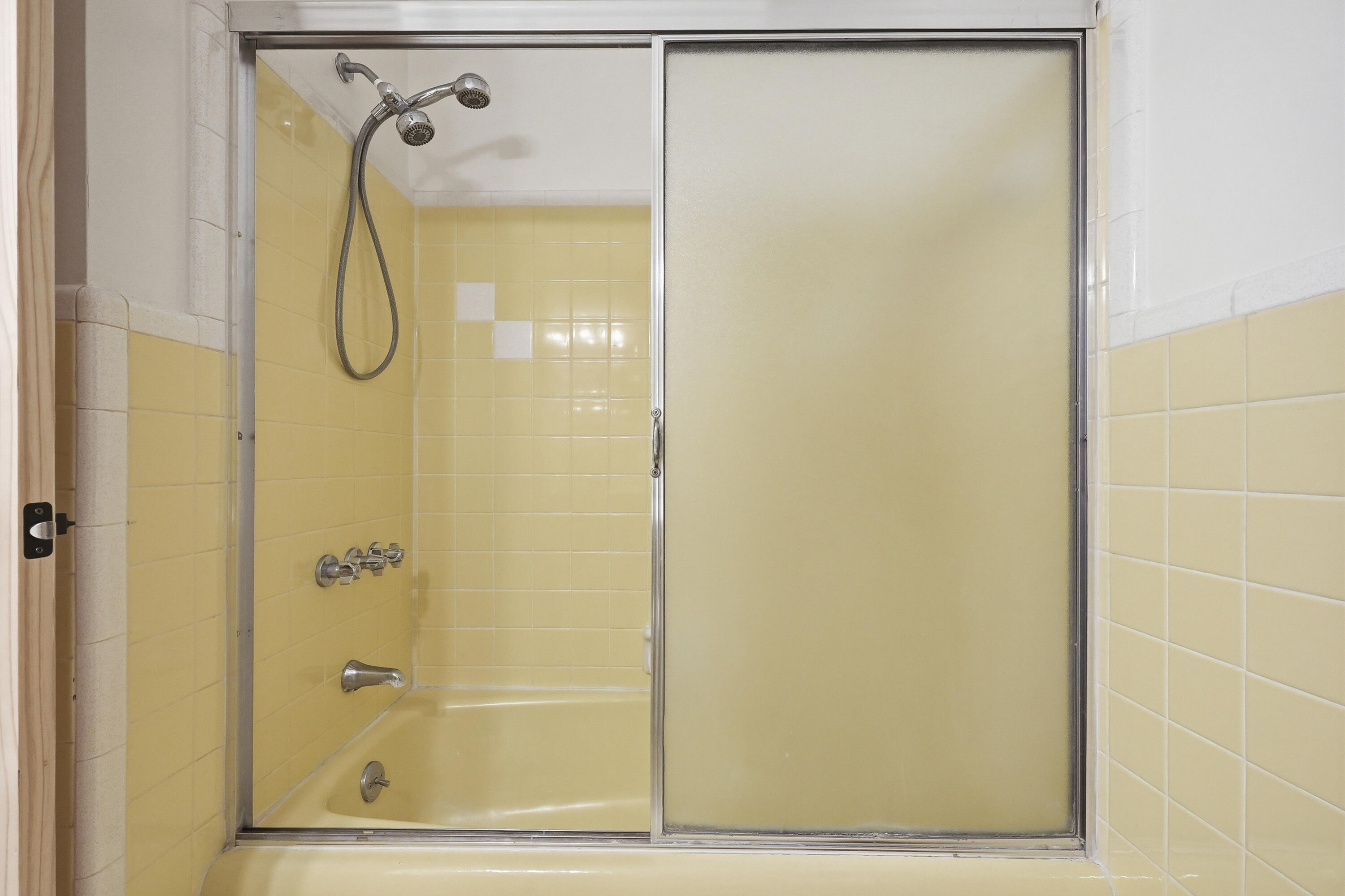 15 Maple Avenue Shalimar, FL 32579 - Photo 27 of 45 a bathroom with a glass shower door