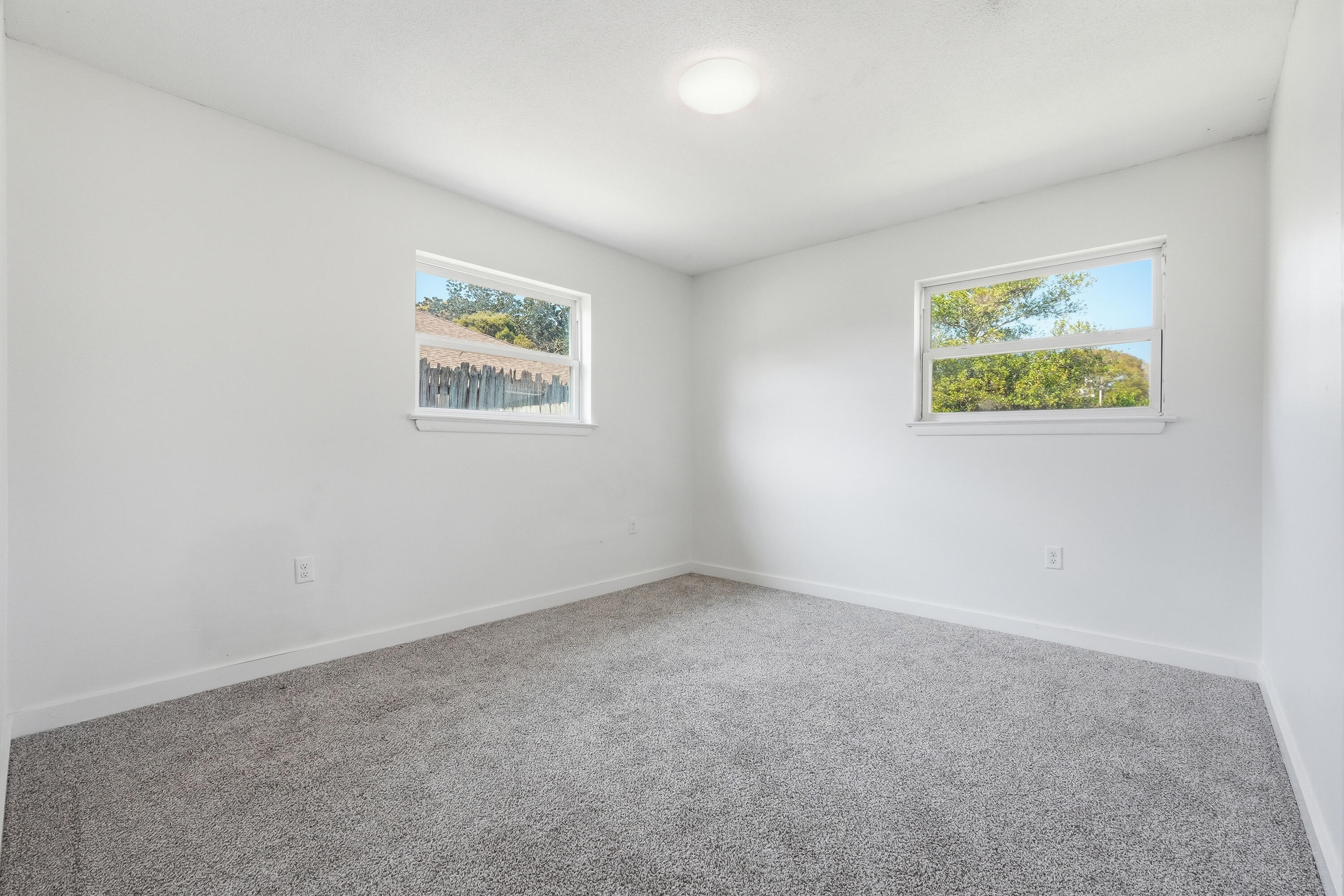 15 Maple Avenue Shalimar, FL 32579 - Photo 28 of 45 an empty room with windows