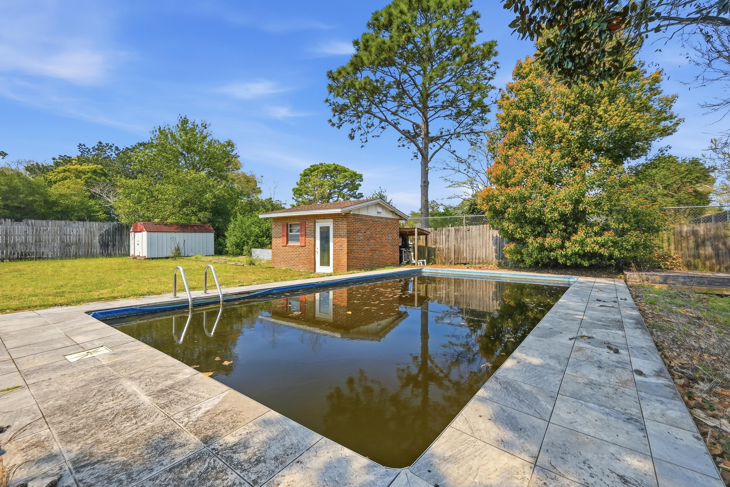 15 Maple Avenue Shalimar, FL 32579 - Photo 42 of 45 swimming pool view with a outdoor space