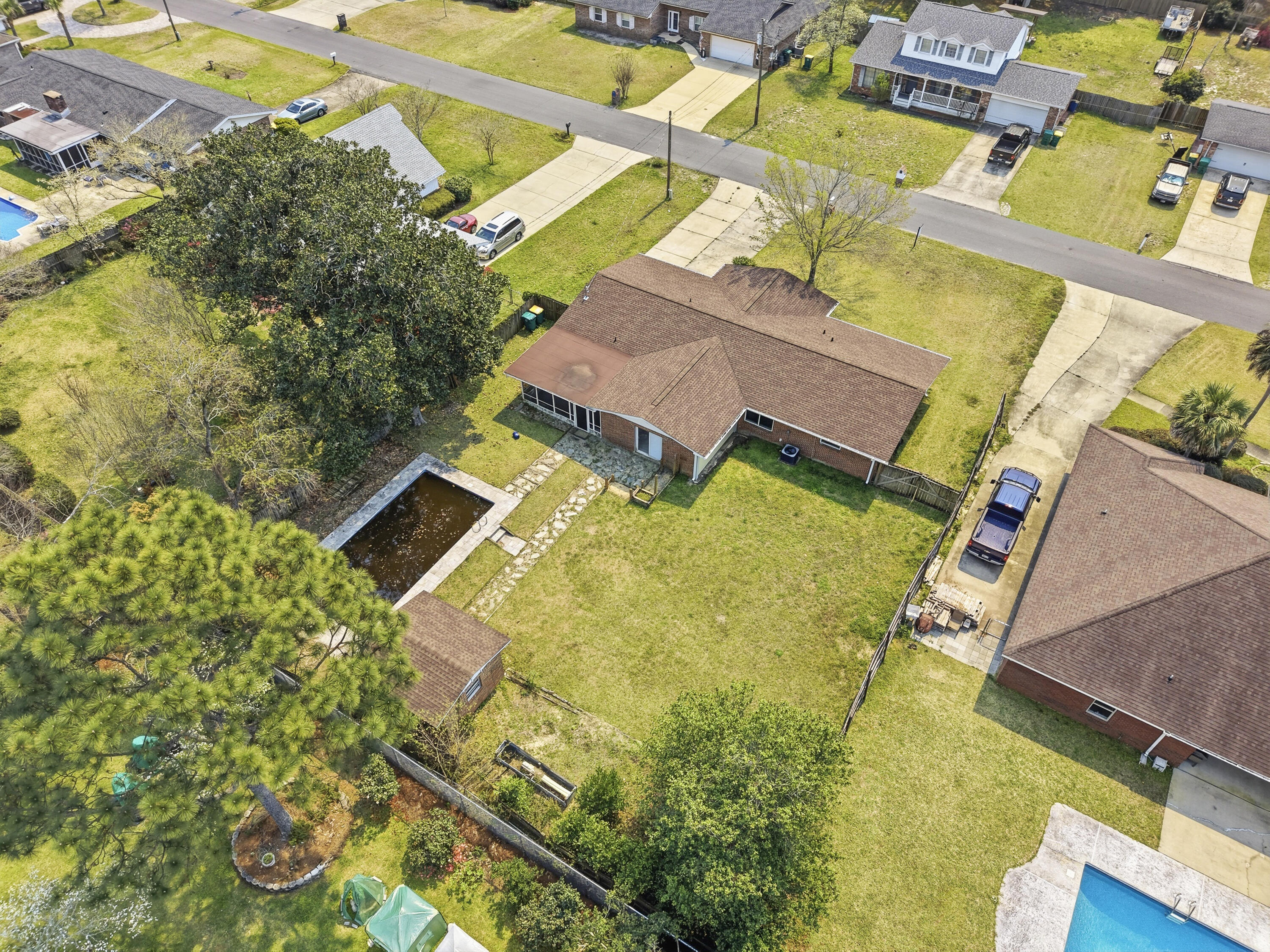 15 Maple Avenue Shalimar, FL 32579 - Photo 5 of 45 an aerial view of a house with swimming pool