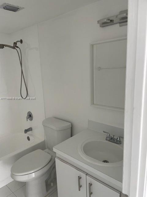 Fountainebleau Miami, FL 33172 - Photo 8 of 18 a bathroom with a sink a toilet and shower