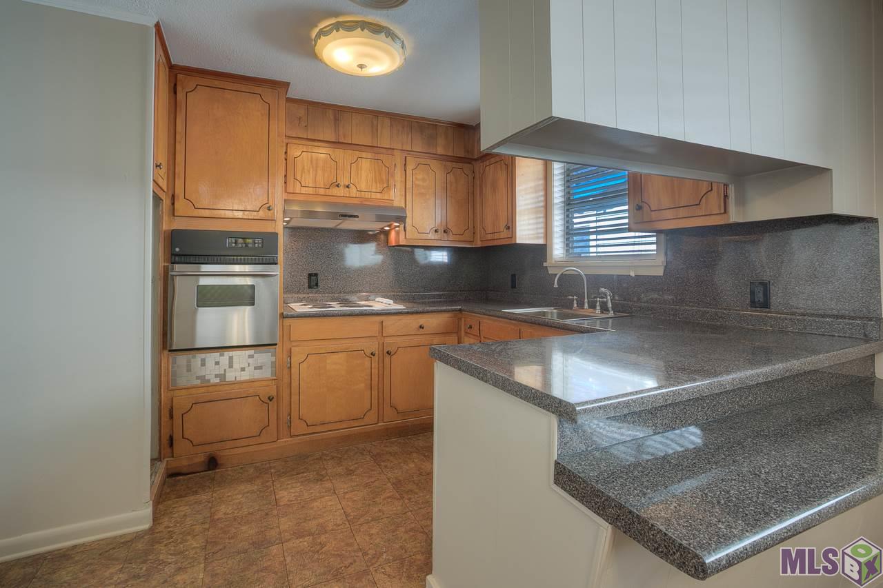 8357 Thelma Street Baton Rouge, LA 70807 - Photo 4 of 19 You'll love the Breakfast Bar and Stainless Wall Oven