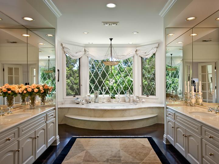 786 Hot Springs Road Montecito, CA 93108 - Photo 5 of 6 a bathroom with a double vanity sink large mirror and a bathtub