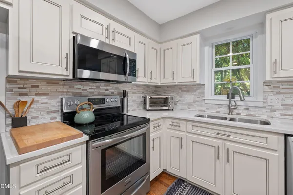 $675,000 | 8409 Kestrel Drive, Raleigh, NC 27615