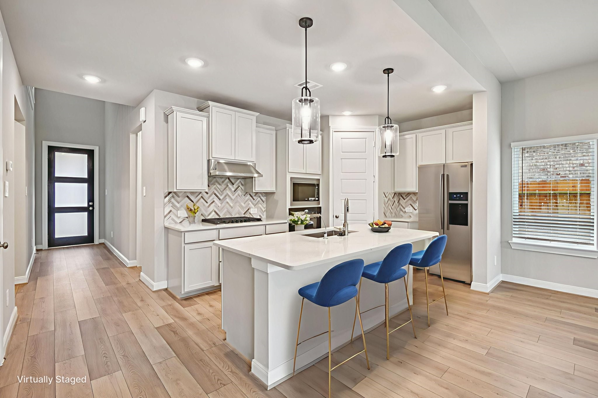 224 Raine Manor Montgomery, TX 77316 - Photo 13 of 50 a large kitchen with a table and chairs
