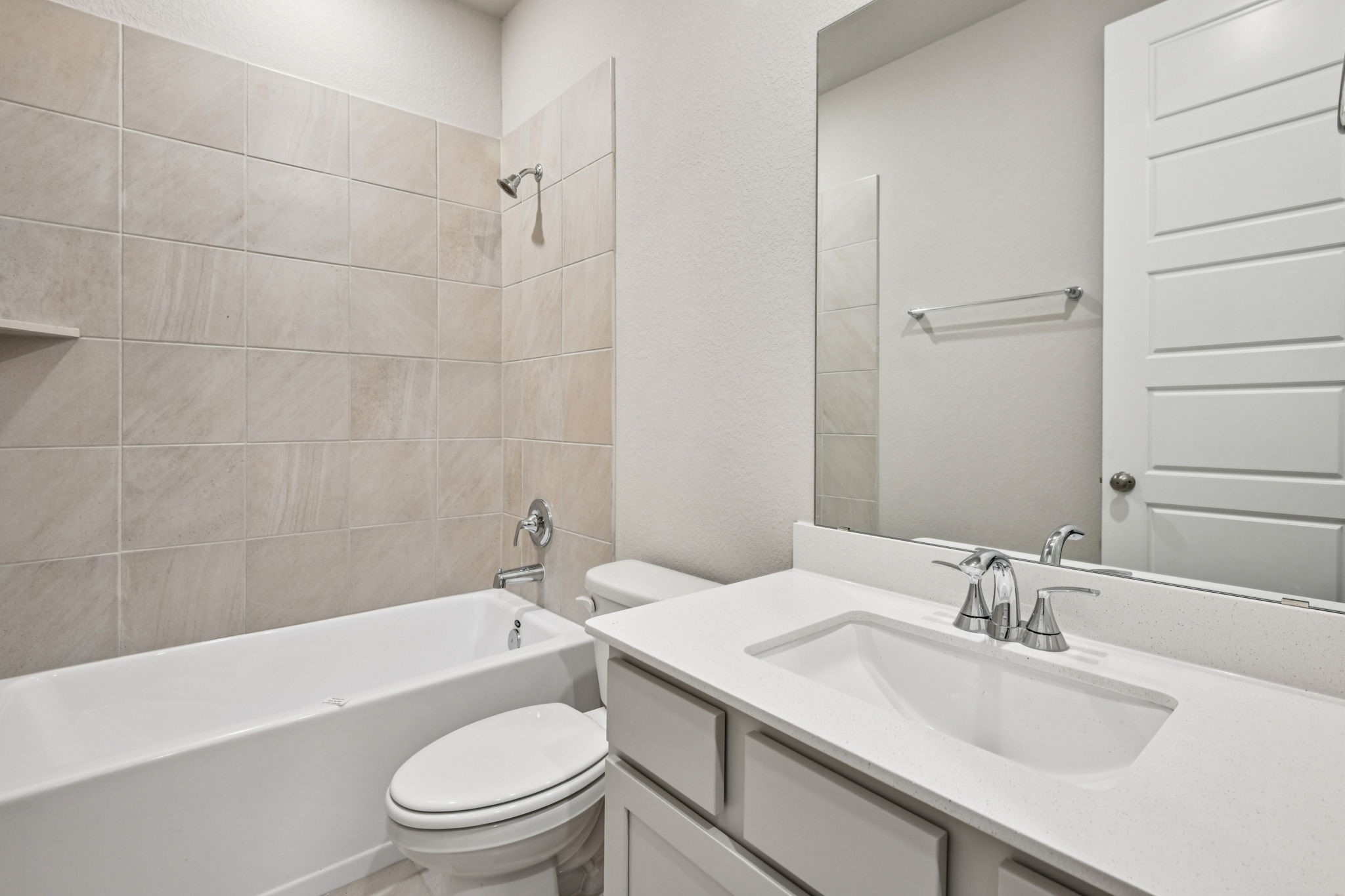 224 Raine Manor Montgomery, TX 77316 - Photo 17 of 50 a bathroom with a sink a toilet and a bathtub