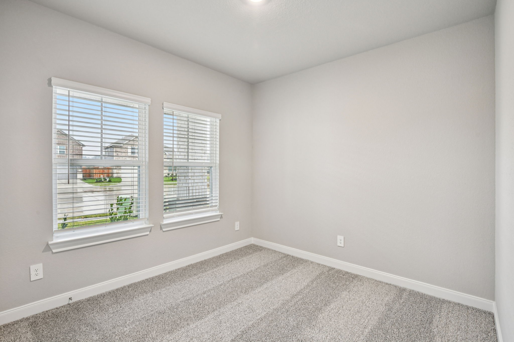 224 Raine Manor Montgomery, TX 77316 - Photo 18 of 50 an empty room with a window