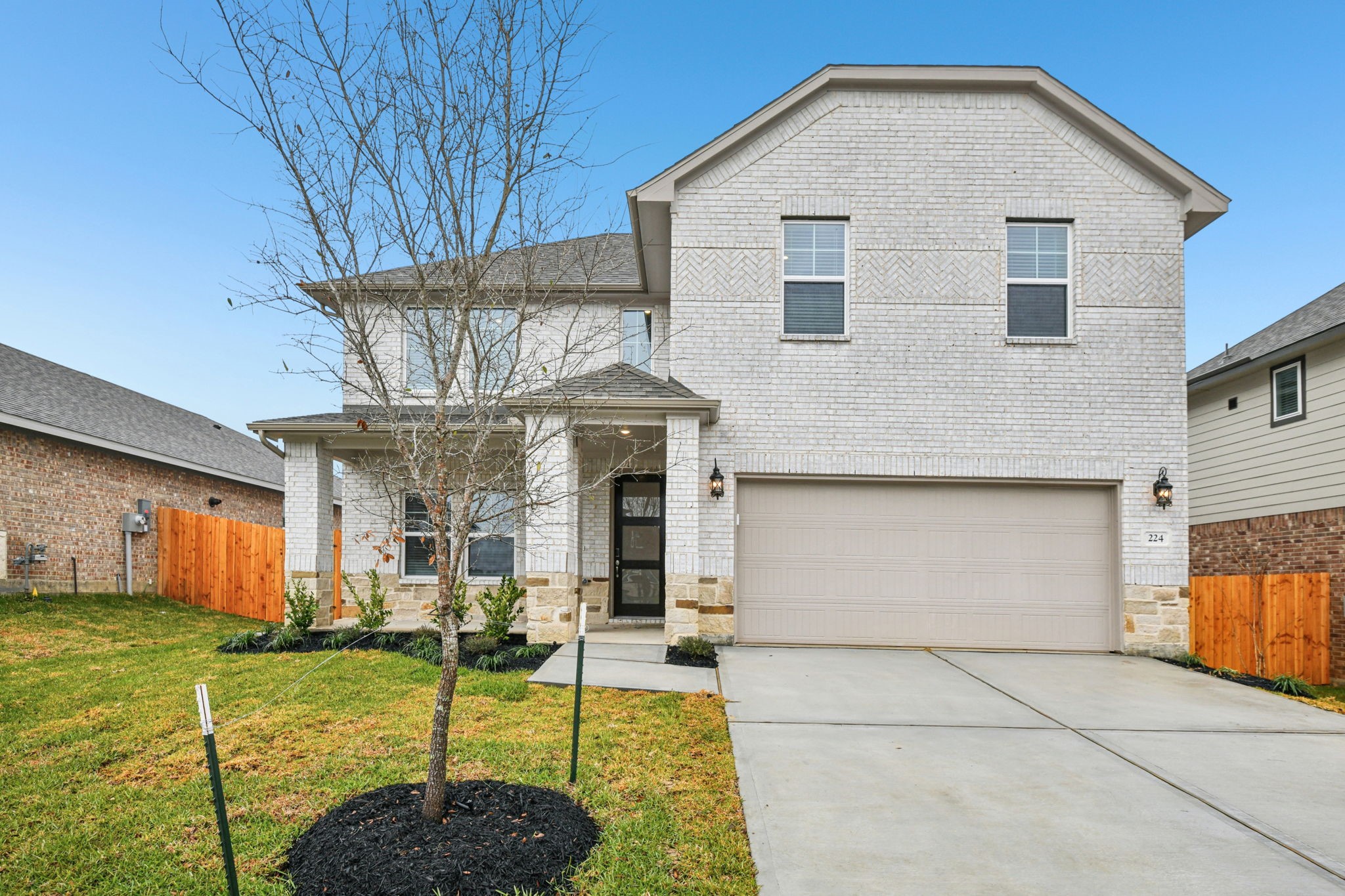 224 Raine Manor Montgomery, TX 77316 - Photo 2 of 50 a view of a house with backyard