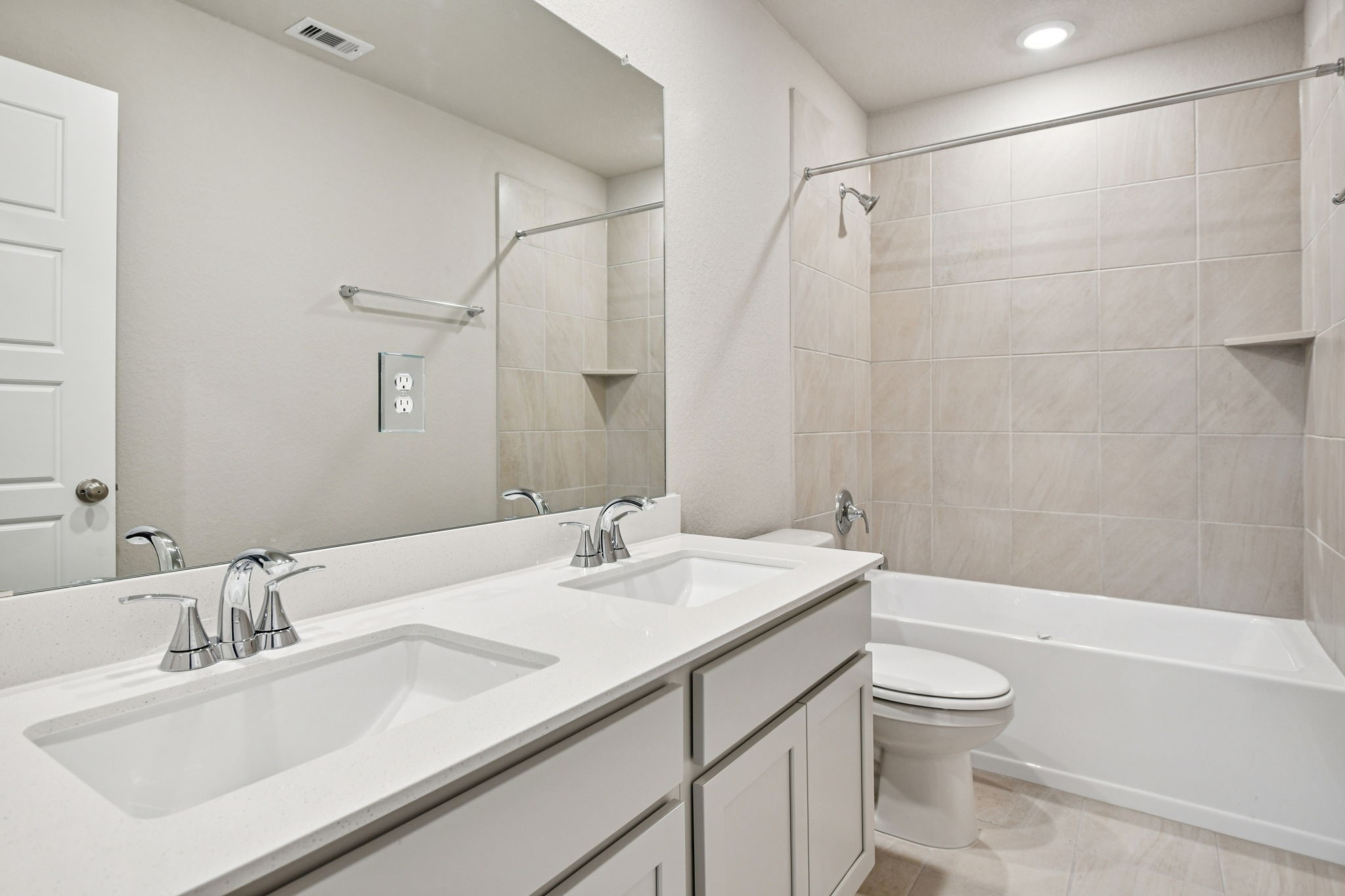 224 Raine Manor Montgomery, TX 77316 - Photo 37 of 50 a bathroom with a granite countertop sink toilet and shower