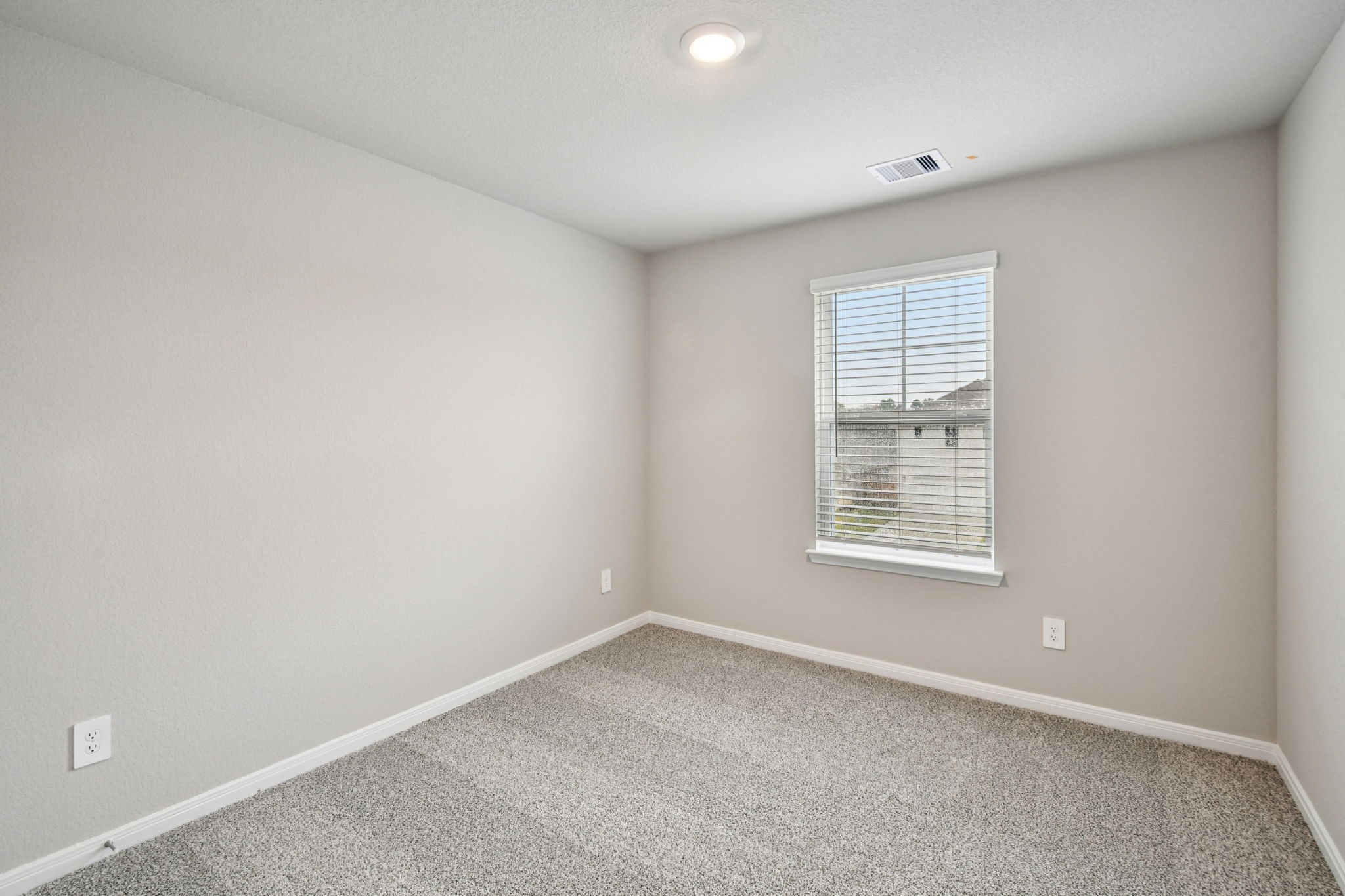 224 Raine Manor Montgomery, TX 77316 - Photo 41 of 50 an empty room with a window