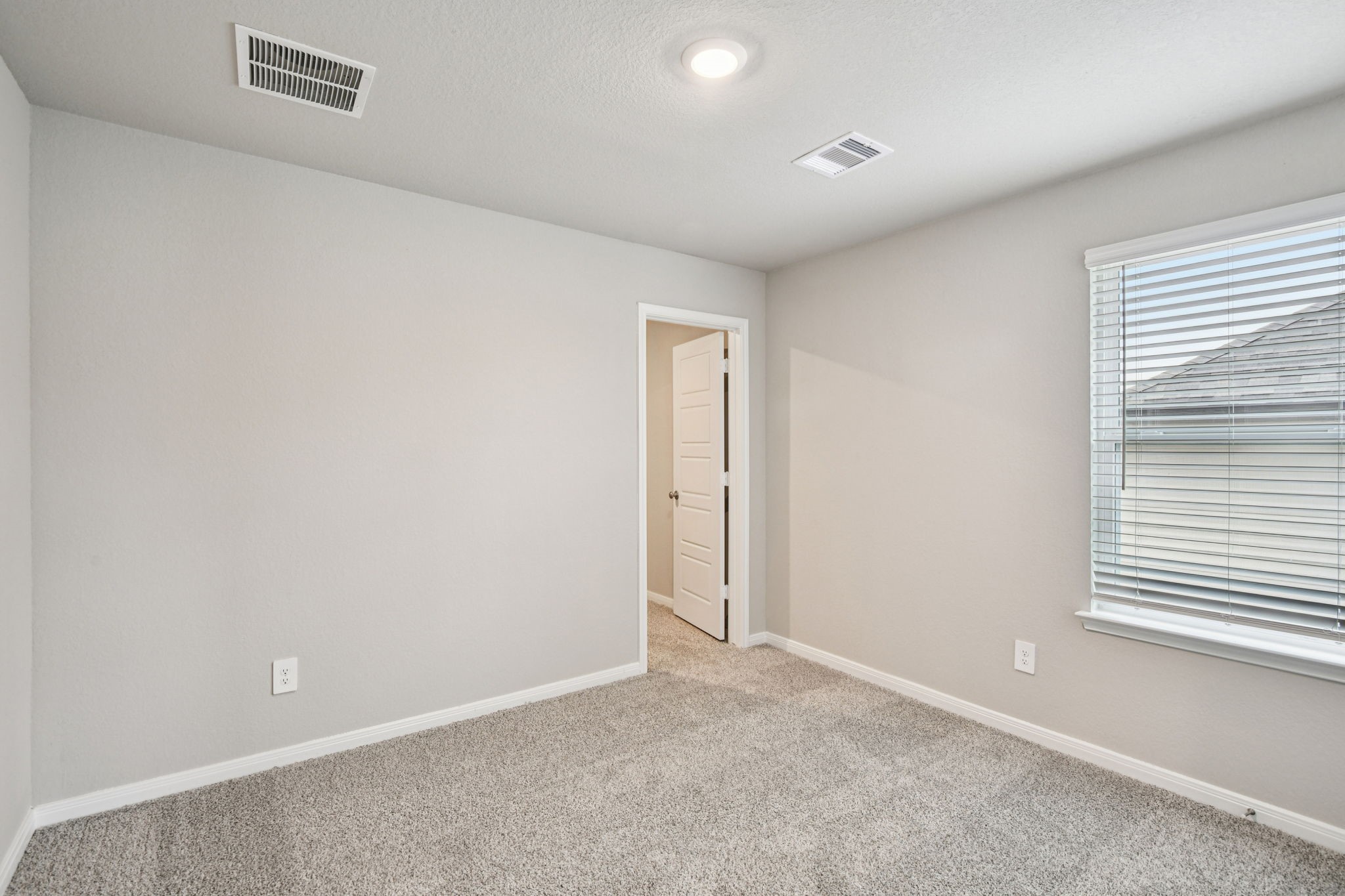 224 Raine Manor Montgomery, TX 77316 - Photo 43 of 50 an empty room with a window