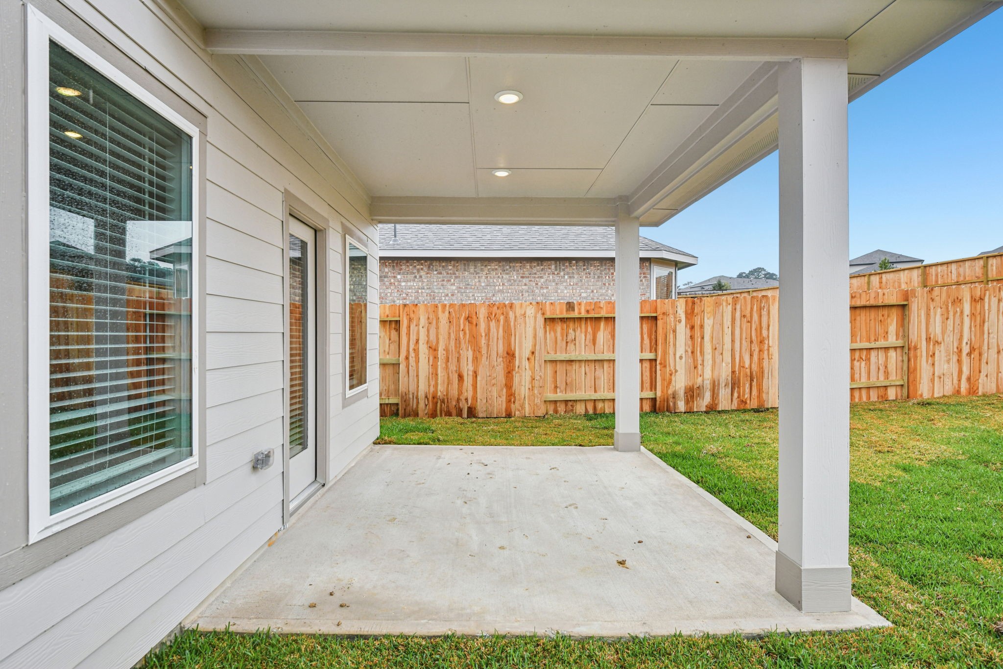 224 Raine Manor Montgomery, TX 77316 - Photo 45 of 50 a view of a porch with a backyard