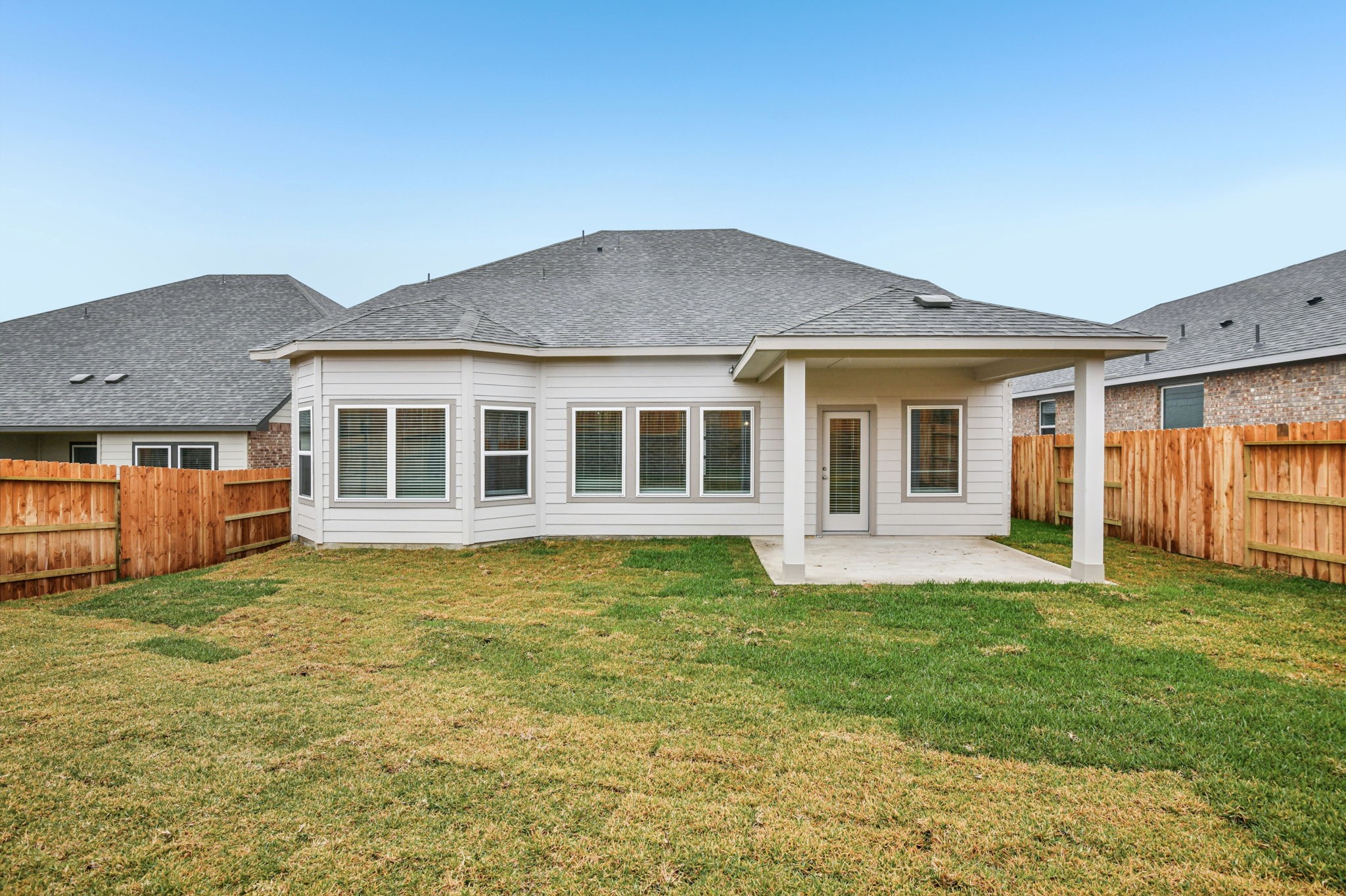 224 Raine Manor Montgomery, TX 77316 - Photo 47 of 50 a view of a house with a yard and a large window