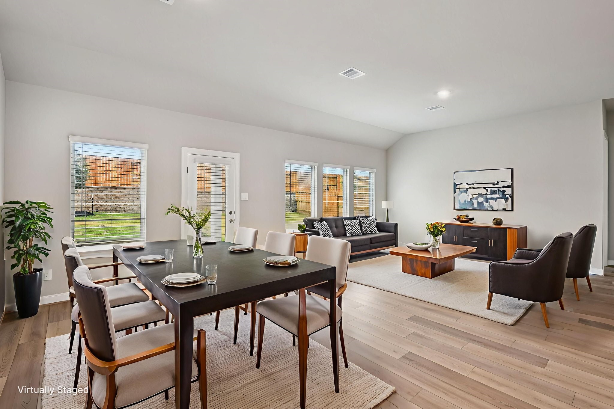 224 Raine Manor Montgomery, TX 77316 - Photo 6 of 50 a view of a livingroom with furniture and a potted plant
