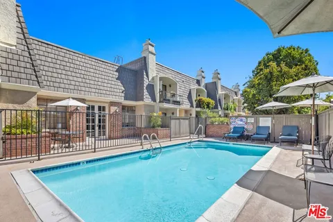 a view of a house with a swimming pool