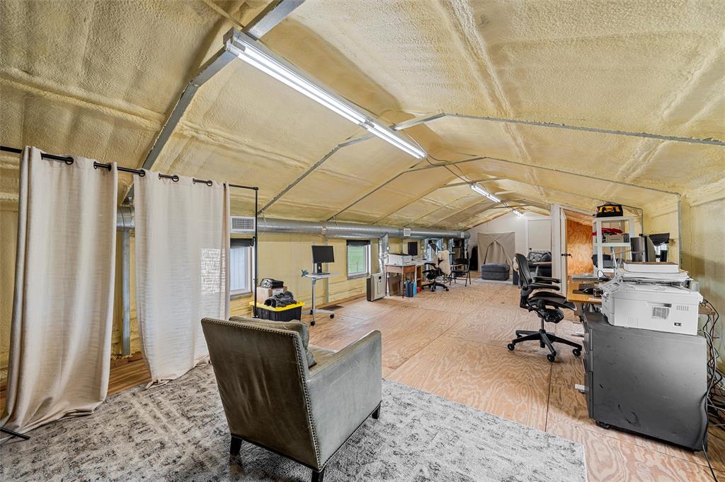 1197 Prairie Chapel Road Crawford, TX 76638 - Photo 38 of 40 Miscellaneous room featuring vaulted ceiling and a desk