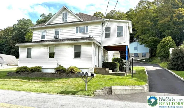 a view of a house with a patio