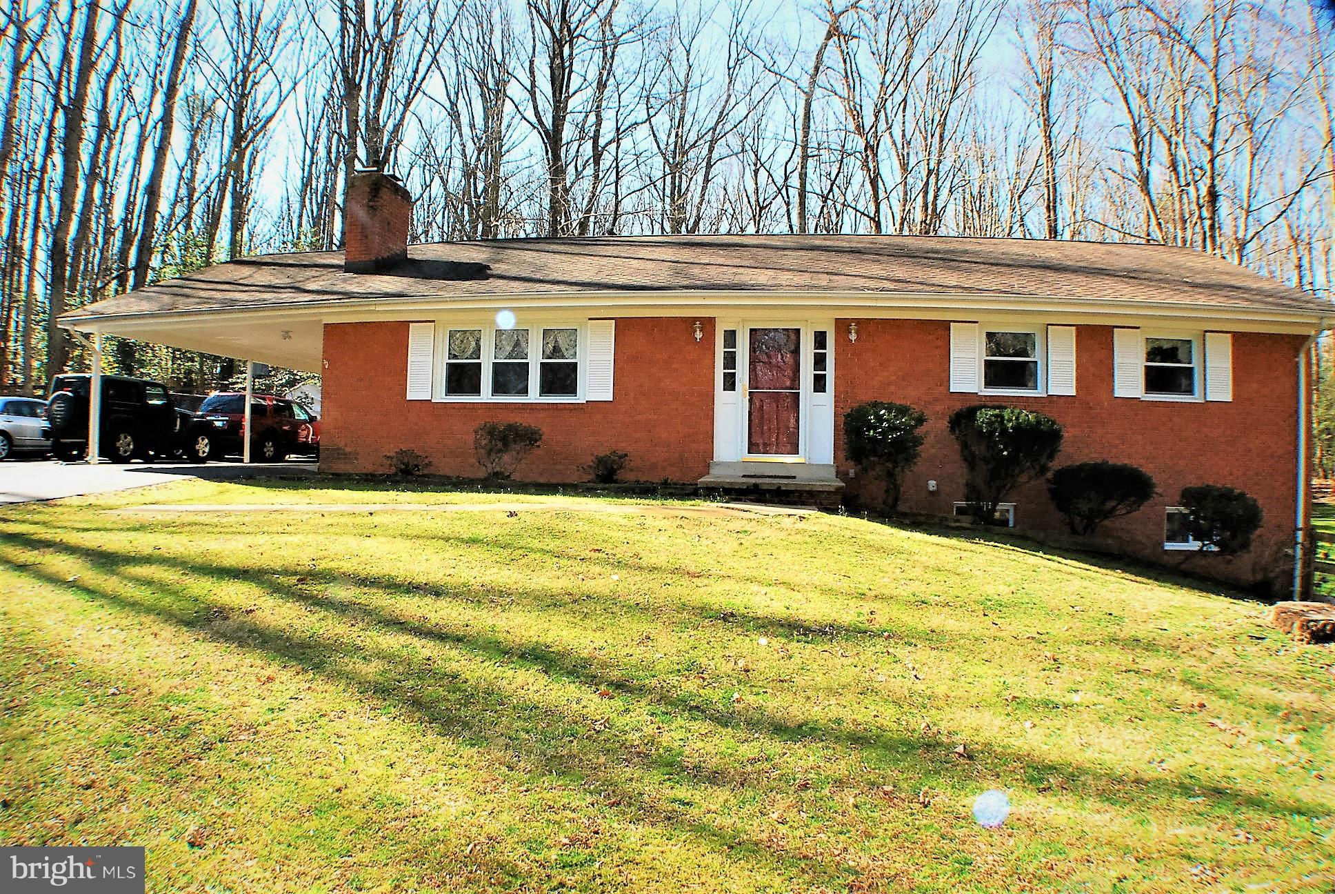 6909 Harvey Road Manassas, VA 20112 - Photo 1 of 30 Exterior (Front) All Brick Home