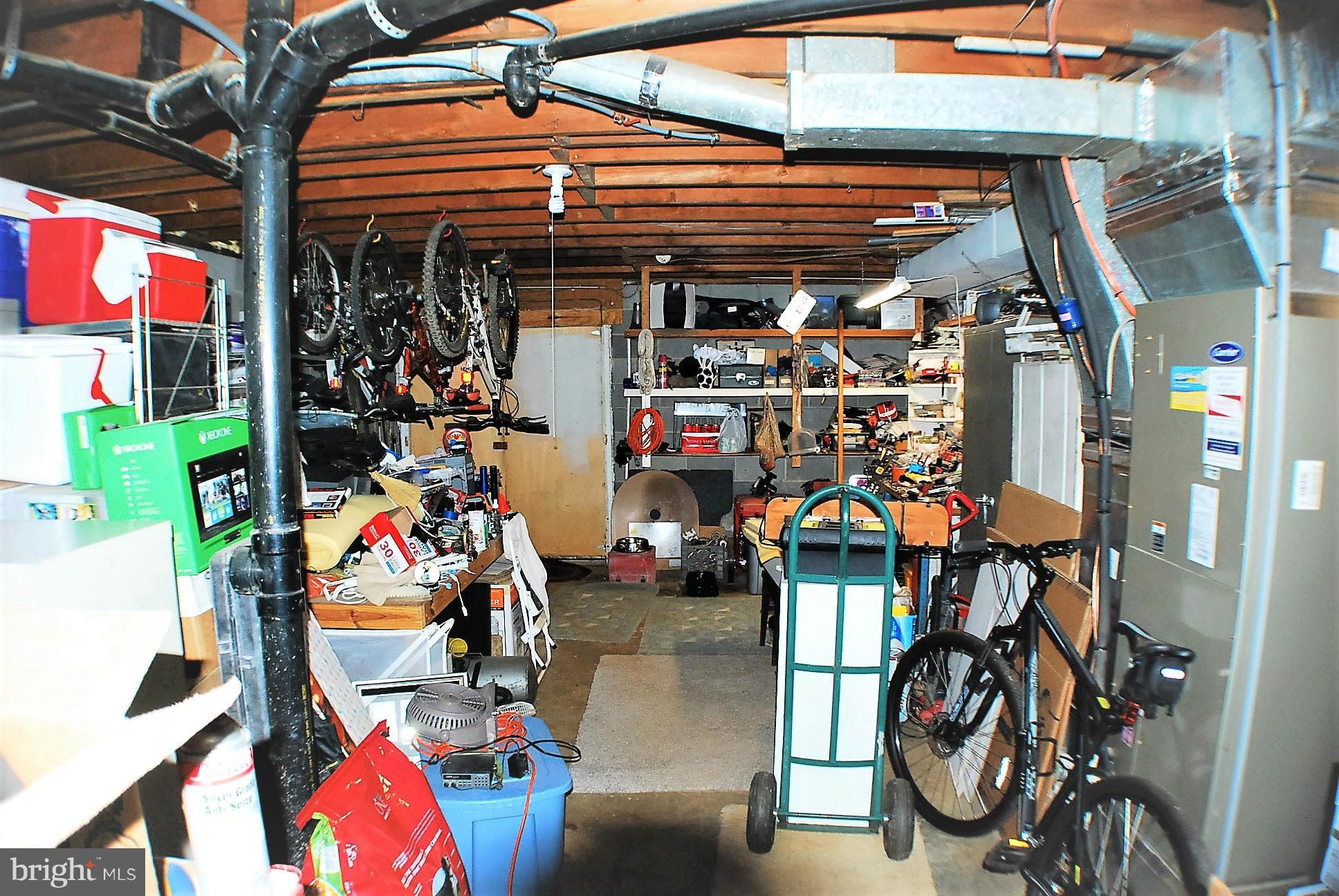 6909 Harvey Road Manassas, VA 20112 - Photo 21 of 30 Basement work room / Storage room