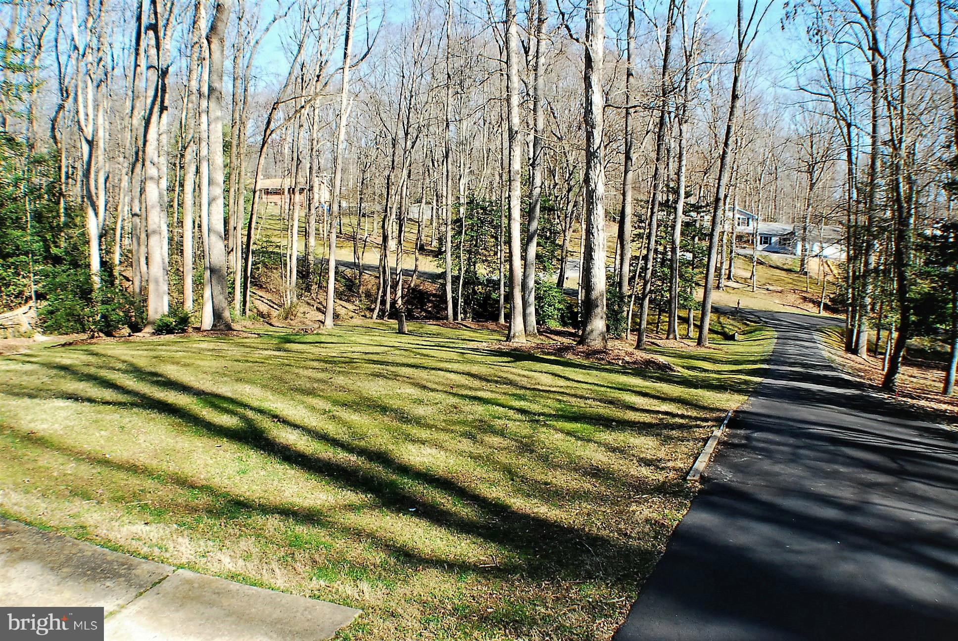 6909 Harvey Road Manassas, VA 20112 - Photo 28 of 30 View Front Yard and Paved Drive