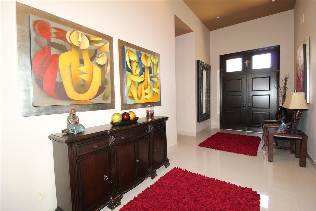 8314 Deer Ridge Boulevard Laredo, TX 78045 - Photo 17 of 20 a bedroom with a bed and a dresser