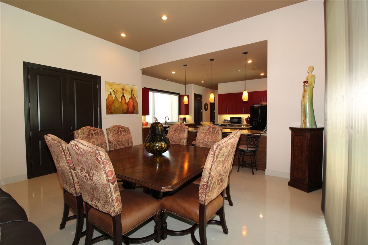 8314 Deer Ridge Boulevard Laredo, TX 78045 - Photo 7 of 20 a view of a dining room with furniture
