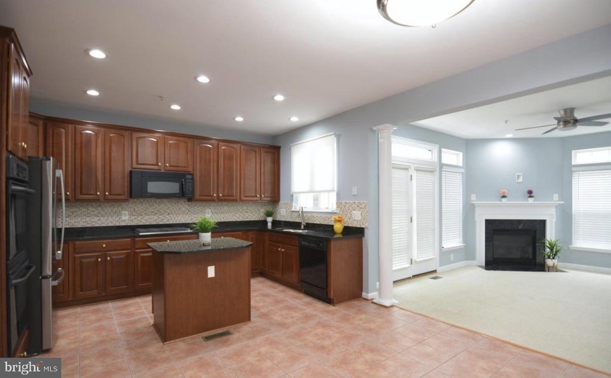 422 Sheila Street Gaithersburg, MD 20878 - Photo 12 of 46 Cozy Family Room Adjacent to Kitchen