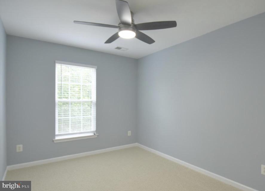 422 Sheila Street Gaithersburg, MD 20878 - Photo 25 of 46 Third Bedroom with New Fan/Light Fixture