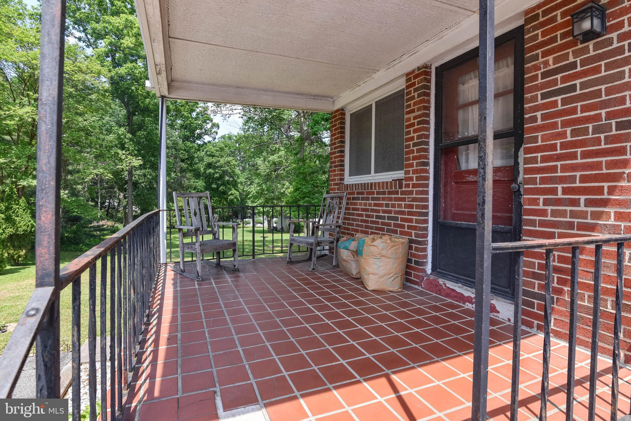 4428 Forge Road Perry Hall, MD 21128 - Photo 2 of 27 a view of a porch with wooden floor