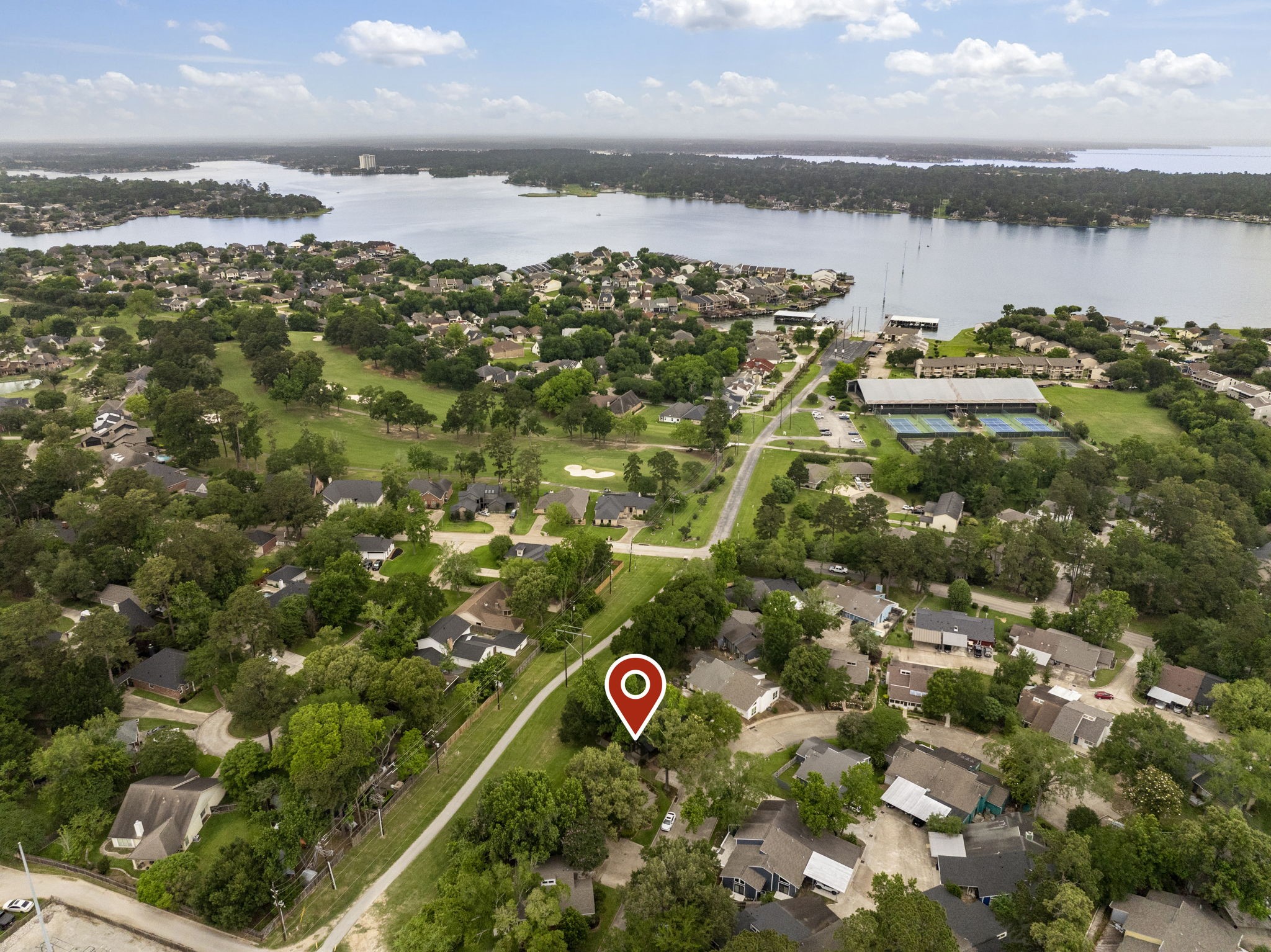 49 April Village Conroe, TX 77356 - Photo 32 of 46 a view of a lake with outdoor space