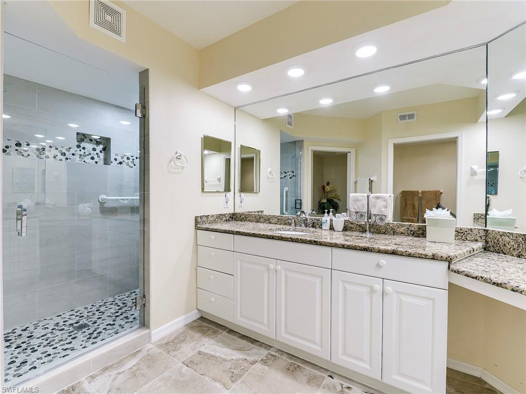 10751 Halfmoon Shoal Road, Unit 101 Estero, FL 34135 - Photo 16 of 45 Beautiful new Walk-In Shower with Frameless shower door