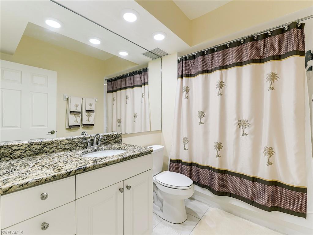 10751 Halfmoon Shoal Road, Unit 101 Estero, FL 34135 - Photo 21 of 45 Guest Bathroom offers Granite Countertops